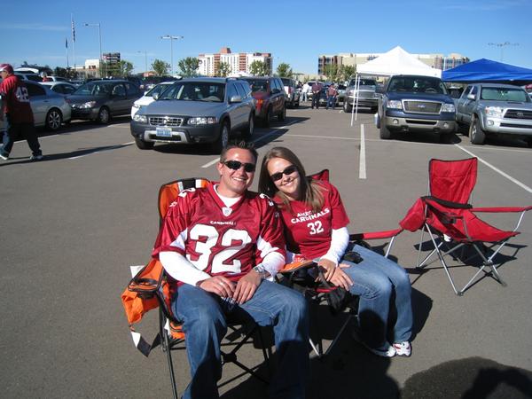 What's a football game without pre-drinking?  It's cheaper in the lot!  

This is my first pic of me displaying my ugly mug.  The hottie next to me is my g/f Emily.